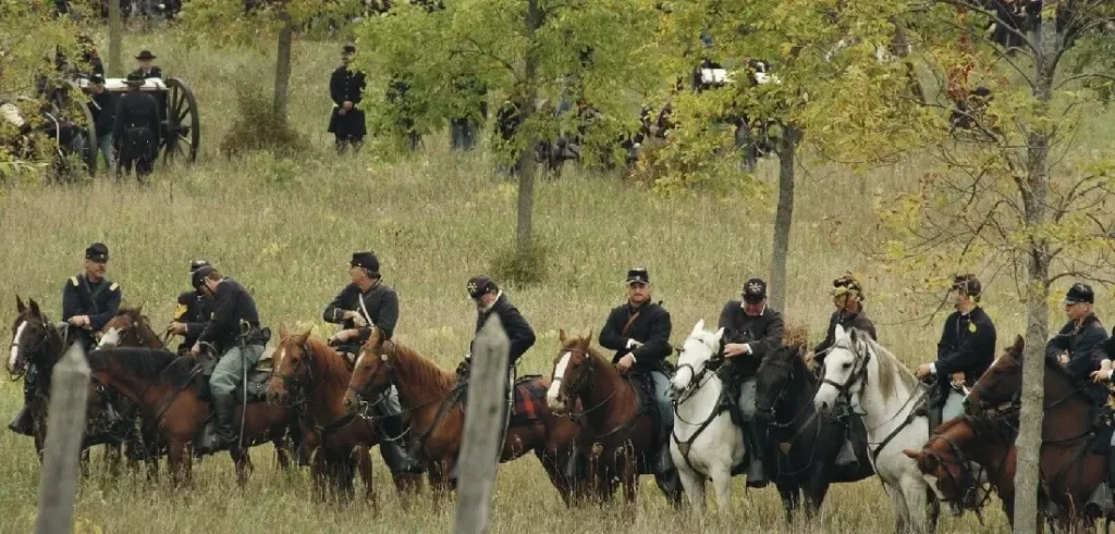 Movie extras on horseback